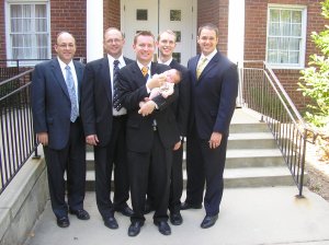 Fiona with those who participated in her naming and blessing (left to right): our bishop; Dustin's stepfather; Dustin; one of Dustin's mission companions; and one of Dustin's friends.