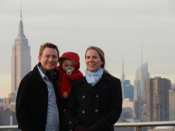 This photo accompanied our letter, both in the mail and on Facebook. We were standing on the pier—which, as you can see, offers a great view of the Midtown Manhattan skyline—at the end of North 5th Street in Williamsburg, Brooklyn. Over Dustin’s right shoulder is the Empire State Building, and the spires over Susan’s left shoulder are, left to right, 4 Times Square (also known as the Condé Nast Building) and the Bank of America Tower at 1 Bryant Park.