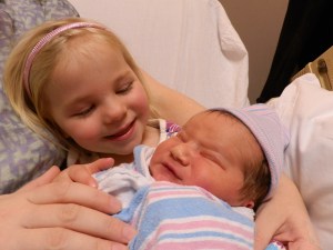 16.55  |  3 January  Fiona meets and holds Colin for the first time. It was love at first sight.